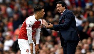 أوناي إيمري ومسعود أوزيل