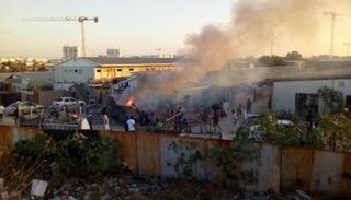 جانب من الاشتباكات الدائرة في طرابلس