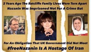 لافتة تضامن مع المحتجزة بسجون إيران نازانين راتكليف وأسرتها