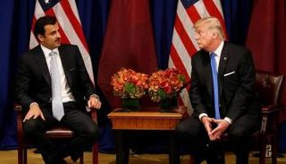 الرئيس الأمريكي وأمير قطر في لقاء سابق