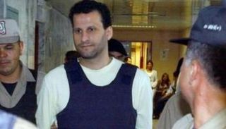 صورة أرشيفية متداولة لبركات أثناء القبض عليه عام 2003