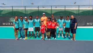 كيفن أندرسون مع لاعبي الأولمبياد الخاص