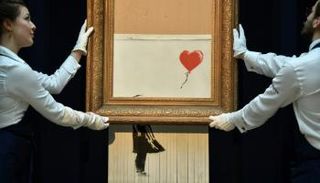 اللوحة بعد تمزقها في المزاد أكتوبر الماضي