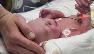 أمريكية في غيبوبة منذ 10 سنوات تنجب طفلا - أرشيفية