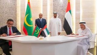 الشيخ محمد بن زايد ورئيس موريتانيا يشهدان توقيع اتفاقية بين البلدين