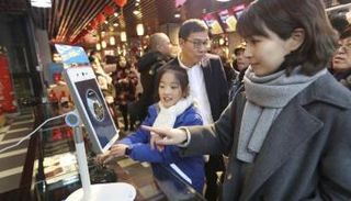 شارع صيني يطبق تقنية التعرف على الوجه في السداد