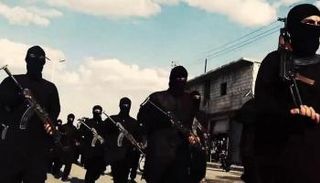 عناصر من تنظيم داعش في سوريا - أرشيفية