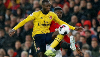 فريق أرسنال في مباراته أمام مانشستر يونايتد