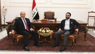 الرئيس العراقي برهم صالح خلال لقاء رئيس مجلس النواب محمد الحلبوسي