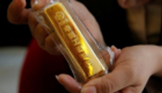 الذهب يغلق الجمعة مستقرا وينهي الأسبوع على مكاسب