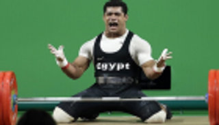 العلم الأولمبي ينقذ حلم محمد إيهاب بطل رفع الأثقال بأولمبياد طوكيو