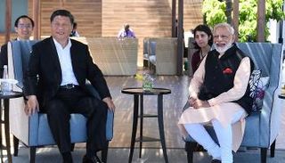 مباحثات رئيس الوزراء الهندي مع الرئيس الصيني