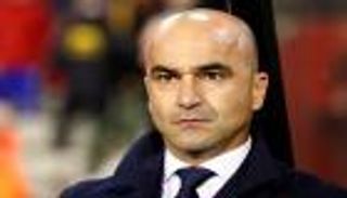 مدرب بلجيكا يشبه لاعبيه بالسفراء