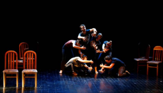 مشهد من مسرحية "باسم الأب"