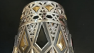 عزة فهمي تستلهم الغيطاني في أحدث تصميماتها وتهديه "سوار قلاوون"