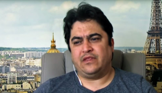 الصحفي الإيراني المعارض روح الله زم 