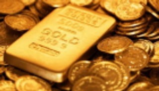 الذهب يتراجع متأثرا بتحسن شهية المستثمرين