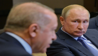 الرئيس الروسي خلال لقاء نظيره التركي - رويترز 