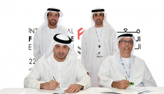 إحدى الاتفاقيات التي تم توقيعها في معرض الفرانشايز العالمي بأبوظبي
