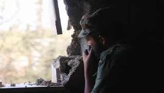 جانب من معركة الجيش الليبي للسيطرة على الأحياء البرية بطرابلس