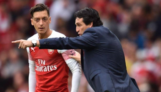 مسعود أوزيل وإيمري