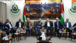 جانب من اجتماع هيئة الانتخابات الفلسطينية بقطاع غزة