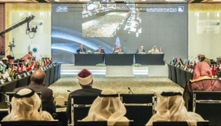 جانب من جلسة مؤتمر مجمع الفقه الإسلامي الدولي 