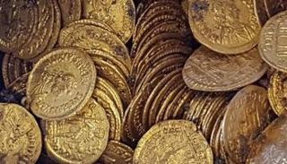 يتم حاليا تقييم العملات من قبل متحف Ulster