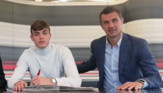 ميلان مع نجله