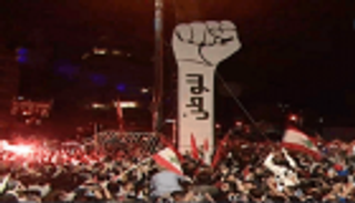 بعد إحراقه.. مجسم الثورة يعود مجددا لساحة الشهداء بلبنان