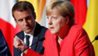 ميركل تنفي حدوث مشادة كلامية مع ماكرون حول "الناتو"