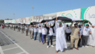 علم الإمارات يدخل موسوعة "جينيس" برقمين قياسيين