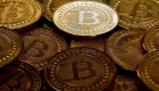 تباين أسعار العملات المشفرة وتراجع بيتكوين