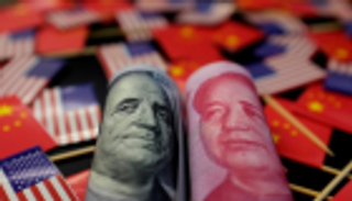 فيتش: توترات التجارة الأمريكية الصينية هدأت لكن لم تُحل