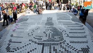 لوحة فنية لقناع توت عنخ آمون تسجل رقما قياسيا بجينيس