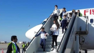 أول رحلة دولية تصل لمطار سفنكس المصري الجديد