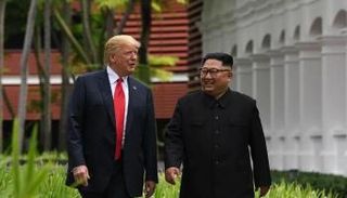 ترامب وكيم خلال قمتهما التاريخية