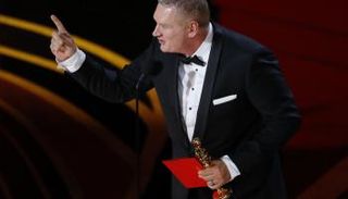 جون أوتمان يتسلم جائزة أفضل مونتاج - رويترز