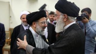 مرشد إيران علي خامنئي وإبراهيم رئيسي