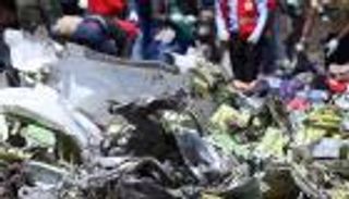 بالصور.. بقايا حطام الطائرة الإثيوبية المنكوبة تنطق بالمأساة 