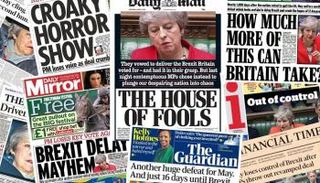 ماي على صدر الصفحات الأولى لصحف بريطانيا 