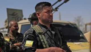 عناصر من سوريا الديمقراطية في الباغوز