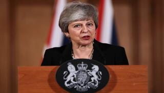 تيريزا ماي تدلي بتصريحات بعد اجتماع الحكومة البريطانية- أ ف ب