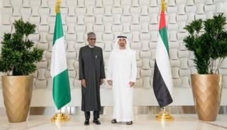 الشيخ محمد بن زايد آل نهيان خلال استقباله الرئيس النيجيري