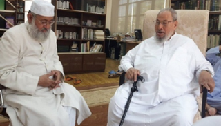 الإرهابي يوسف القرضاوي وسلمان الندوي في الدوحة- أرشيفية