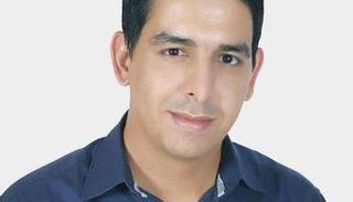 الروائي المغربي طارق بكاري