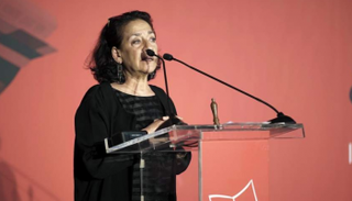 هدى بركات خلال إلقاء كلمتها التي أثارت الضجة