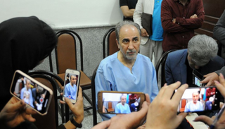 عمدة طهران السابق خلال التحقيقات - أرشيفية