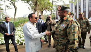 آبي أحمد مع رئيس المجلس العسكري السوداني-أرشيفية