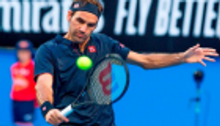 فيدرر يستهل موسم الملاعب العشبية بالفوز على ميلمان